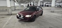 Mazda 323f BJ 1.9,  Ny besiktad, SoV-däck 