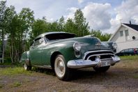 Oldsmobile 98 Futuramic De-Luxe Sedan –49