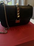 Valentino Garavani Glam Lock leather crossbody bag