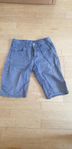 Stålblå shorts från Lindex storlek 140