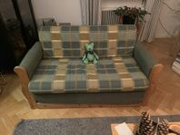 grön soffa (sovsoffa)