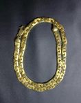 Charmigt halsband i 18K guld säljs