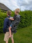 Vandrings ryggsäck med sits för barn 