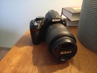 Nikon D3100 + AF-S DX 18-55 VR, kameraväska, 1GB SD
