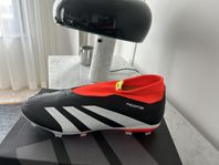 helt nya adidas predator fotbollsskor slumpas bort 