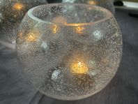 Tre ljusglober i glas stilfull inredningsdetalj