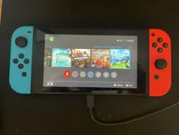 Nintendo Switch + (Zelda BoW & Zelda TotK + 5 spel)