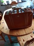 Vintage resväska brun orange skinn låsbar.