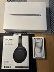 Boxes of iPhone 15, MacBook Air, Sony headphones 