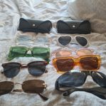 8 olika par solglasögon + två fodral