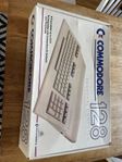 Commodore 128 i kartong med diskdrive 1571, tac-2 mm