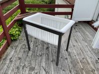 stokke vagga samt passande babynest 