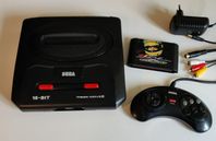 Sega Mega Drive II med kontroll och spel