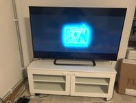 TCL 55” and IKEA white TV stand 