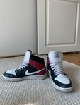 Jordan 1 Mid Black Noble Red (Women's)