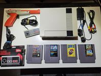 Nintendo 8 bits + zapper + 5 spel - NES - SCN