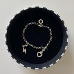 Thomas Sabo charm-armband med berlocker och förpackning