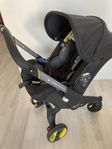 Doona bilbarnstol med isofix och oöppnad regnskydd 