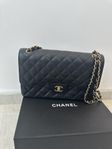 Chanel Classic Double Flap Jumbo Black Caviar Gold