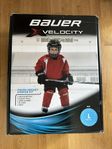 Hockeyskydd Bauer startkit 7-9 år i svart och rött