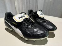 Fotbollsskor Puma King top FG strl 42,5