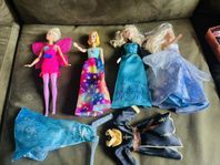 4 stycken Barbie plus två klänningar 