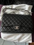 Chanel maxi caviar