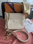 Louis Vuitton Cream Giant monogram Empreinte Multi pochette 