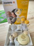 Medela Swing Flex dubbelpump med extra tillbehör