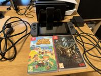 Nintendo switch med två spel animal crossing diablo. Grå v