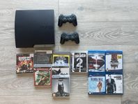 PS3 slim, 2 handkontroller, spel och filmer