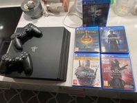 PS4 pro med 2 handkontroller och 5 spel