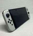 Nintendo Switch OLED med reseväska och tillbehör