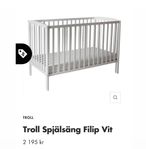 Vit oanvänd spjälsäng från Troll