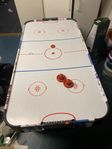 Air-hockey spel