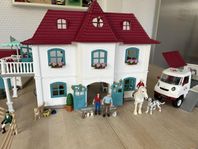 Schleich hus med stall och djurambulans