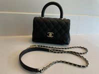 Chanel Mini flap bag with top handle