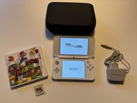 Nintendo New 2DS XL med spel och laddare