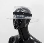 Chanel, a transparent PVC hat, size M.