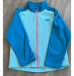 Helly Hansen fleece och POC skidhjälm 