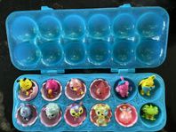 12 st Hatchimals Collectibles med låda samt korg