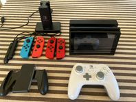 Nintendo Switch + 6 spel med extra joy-cons med laddstation