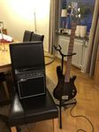 El bas gitarr med förstärkare 15watt