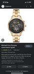 Michael kors guld  smartwatch oanvänd med plast på