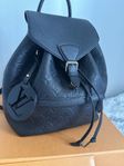 Louis Vuitton handbag/backpack