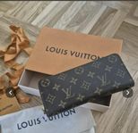 Louis vuitton clémence plånbok 