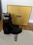 FENDI Black leather biker boots with stretch fabric.