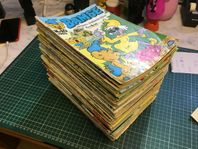 Bamse en kasse med ca 75 tidningar