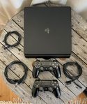 Komplett 1TB Ps4 Slim med 2 handkontroller, HDMI-kabel ingå