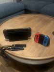 Nintendo switch med ett extra joycon par+6 Spel